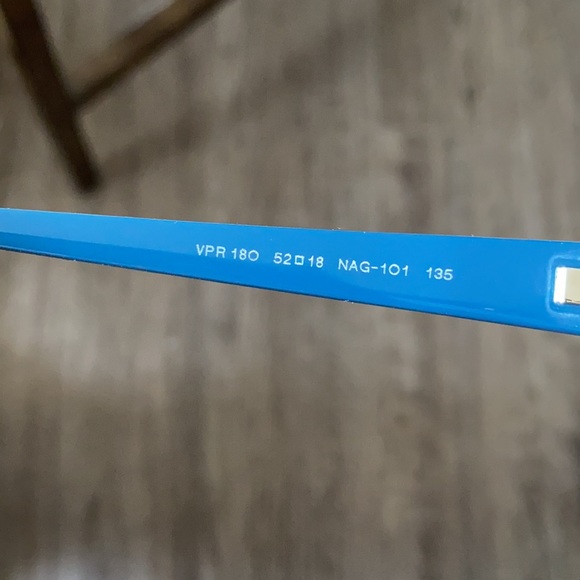 Teal women’s Prada glasses